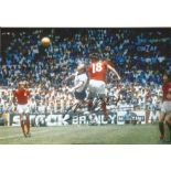 NORMAN HUNTER 1970, football autographed 12 x 8 photo, a superb image depicting the England centre-