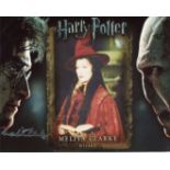 Harry Potter. 8x10 Harry Potter movie photo signed by actress Melita Clarke as a Wizard. Good