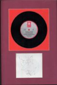 Ian Dury signature piece mounted below 45rpm vinyl record of Inbetweenies. Mounted and framed to