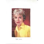 Janet Leigh signed magazine photo. Dedicated. Good Condition. All autographs are genuine hand signed