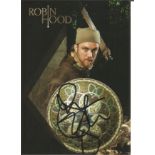 Sam Troughton signed 6x4 Robin Hood colour photo. Troughton is a Shakespearean actor who has