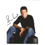 Simon Cowell signed 10x8 colour photo. Good Condition. All autographs are genuine hand signed and