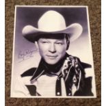 Roy Rogers signed 10x8 black and white photo. American singer, actor, and television host. He was