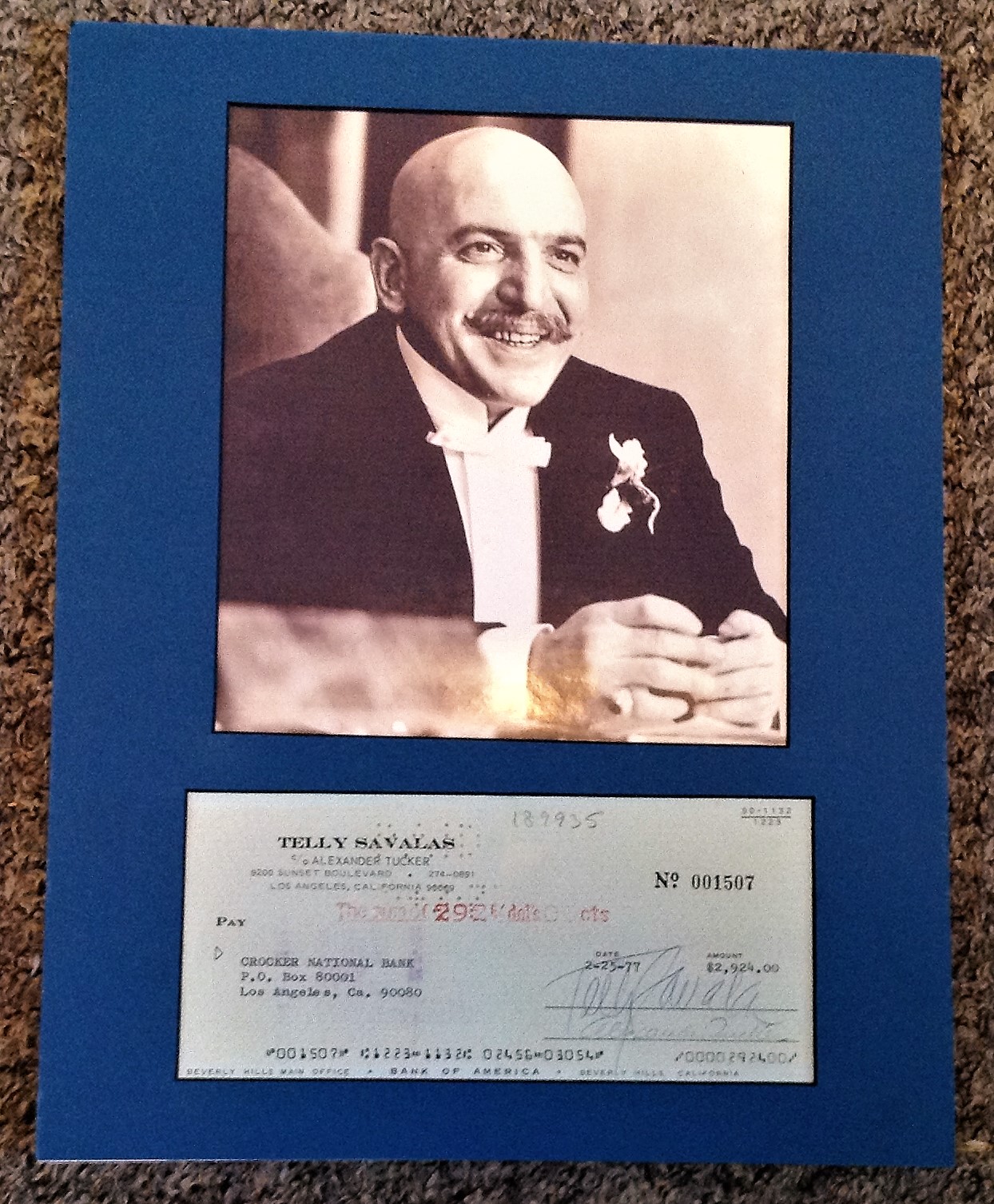 Telly Savalas mounted signature piece includes signed Bank of America cheque and Black and white