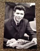 Cliff Richard signed 12x8 black and white. Sir Cliff Richard OBE (born Harry Rodger Webb; 14 October