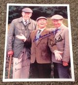 Norman Wisdom, Peter Sallis and Brian Wilde Last of the Summer Wine multi signed 10x8 colour photo.