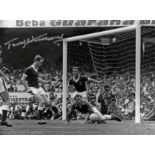 TERRY HENNESSEY 1962: Autographed 8 x 6 photo, depicting a moment of panic in the Welsh penalty area