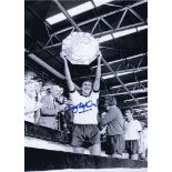 ROY McFARLAND 1975: Autographed 16 x 12 photo, depicting ROY McFARLAND holding aloft the Charity