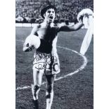 BERTIE AULD 1970: Autographed 16 x 12 photo, depicting Celtic's BERTIE AULD celebrating in front