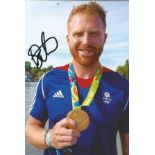 Olympics William Satch signed 6x4 colour photo of the gold and bronze medallist in the Rowing eights