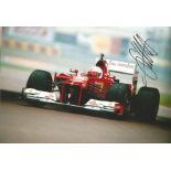 Motor Racing Sebastian Vettel signed 12x8 colour photo pictured driving for Ferrari in Formula