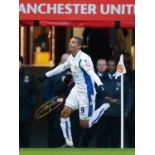 JERMAINE BECKFORD 2010: Autographed 16 x 12 photo, depicting Leeds United centre-forward JERMAINE