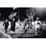 FRANZ ROTH 1974: Autographed 6 x 4 photo, depicting Bayern Munich players including FRANZ ROTH on