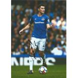 Football Michael Keane signed 12x8 colour photo pictured in action for Everton. Good Condition.