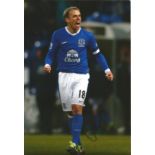 Football Phil Neville signed 12x8 colour photo pictured in action for Everton. Good Condition. All