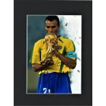 Football Cafu signed 16x12 mounted colour photo pictured with the World Cup trophy after Brazils