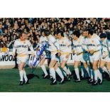 NORMAN HUNTER 1974: Autographed 12 x 8 photo, depicting Leeds United players parading the League