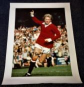 Football Denis Law signed 33x16 colour photo picturing the King Denis Law celebrating while