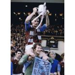 IAN ROSS 1975: Autographed 16 x 12 photo, depicting Aston Villa captain IAN ROSS (on the shoulders