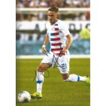 Football Tyler Boyd signed 12x8 colour photo pictured in action for the U, S, A. Good Condition. All