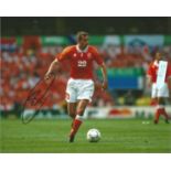 Football Philip Cocu signed 10x8 colour photo pictured in action for Holland. Good Condition. All