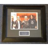 Judas Priest signed colour photo mounted and framed to approx size 18x16. Signed by Rob Halford