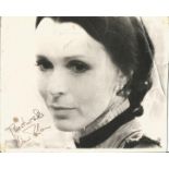 Claire Bloom signed 10x8 black and white photo. Very battered. Good Condition. All autographs are