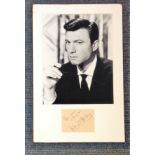 Laurence Harvey signature piece mounted below black and white photo. Approx overall size 14x12. Good