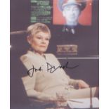James Bond - Judi Dench signed 10 x 8 inch photo of Dame Judi Dench in character. Good Condition.