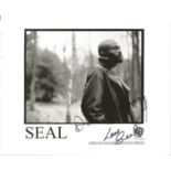 Seal signed 10x8 black and white photo. Dedicated. Good Condition. All autographs are genuine hand