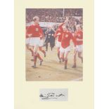 Jack Charlton. Signature mounted with picture parading the World Cup in 1966. Professionally mounted