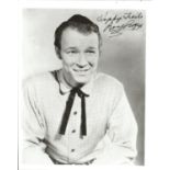 Roy Rogers signed 10x8 black and white photo. Good Condition. All autographs are genuine hand signed