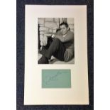 Glenn Ford signature piece mounted below black and white photo. Approx overall size 20x14. Good