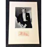 Joel McCrea signature piece mounted below black and white photo. Good Condition. All autographs
