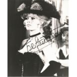 Brigitte Bardot signed 10x8 black and white photo. Good Condition. All autographs are genuine hand