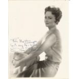 Olivia De Havilland signed 10x8 black and white photo. Good Condition. All autographs are genuine