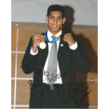 Amir Khan Signed 8x10 Boxing Photo. Good Condition. All autographs are genuine hand signed and