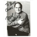 Neil Sedaka signed 10x8 black and white photo. Dedicated. Fold in centre. Good Condition. All