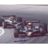 Mario Andretti signed 10 x 8 inch photo during F1 race. Good Condition. All autographs are genuine