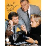 Robert Vaughan signed 14x12 colour Man from Uncle photo. The Man from U. N. C. L. E. is an