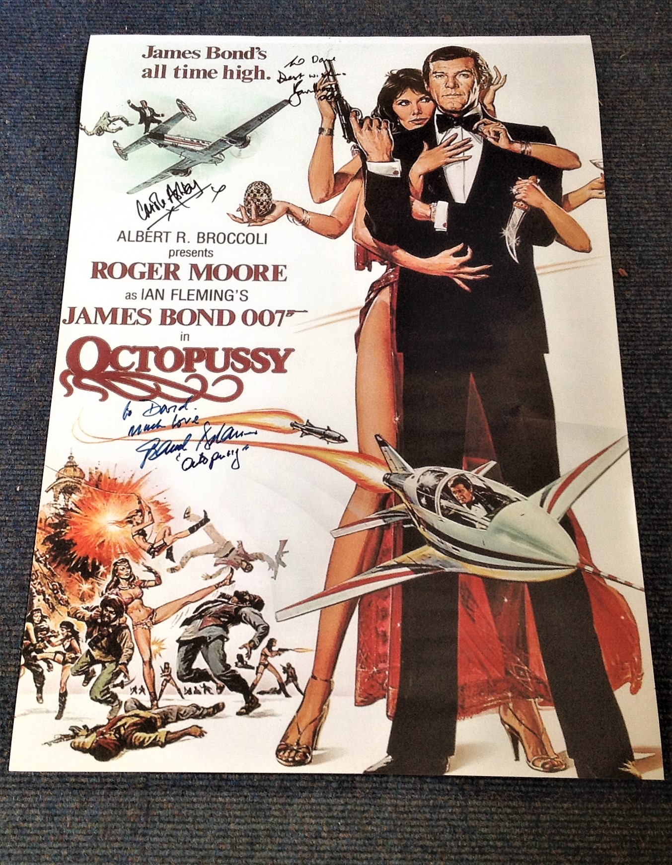 James Bond Octopussy 29x20 poster signed by Roger Moore, Maud Adams and Carole Ashby. Good