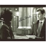 Oliver Skeete signed 8x10 inch b/w photo pictured in his role in James Bond. Good condition. We