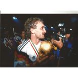 Rudi Voller Germany Signed 12 x 8 inch football photo. This item is from the stock of www.