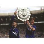 Peter Reid and Wayne Clarke Everton Signed 10 x 8 inch football photo. This item is from the stock