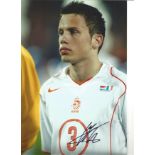 Johnny Heitinga Holland Signed 10 x 8 inch football photo. This item is from the stock of www.