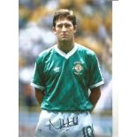 Norman Whiteside Northern Ireland Signed 12 x 8 inch football photo. This item is from the stock