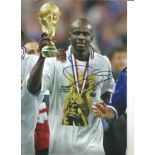 Eric Abidal France Signed 12 x 8 inch football photo. This item is from the stock of www.