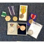Military medal collection 7 interesting items includes 3 USA medals, 1 Polish WW2, 2 East German and