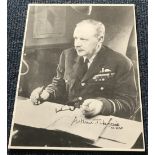 WW2 bomber command leader Arthur Harris MRAF signed 10 x 8 inch b/w photo, sitting at his desk