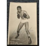 Randolph Turpin boxer signed 6 x 4 inch b/w photo in fight pose.